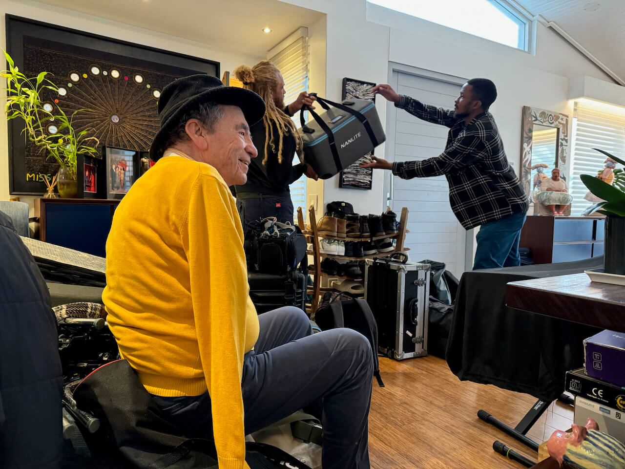 Albie with film equipment and crew Stephan van der Merwe and Odon Mwanza